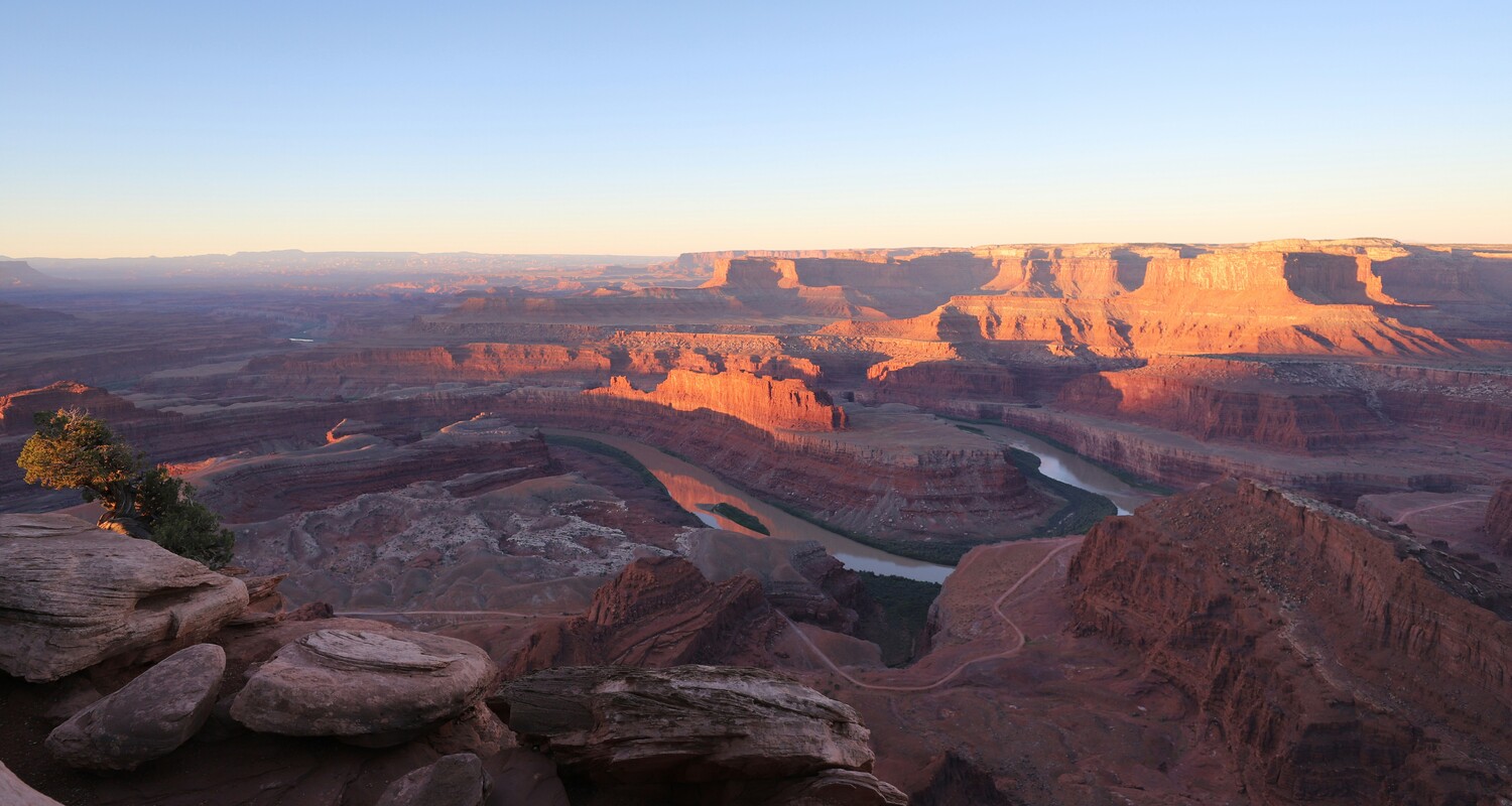 a canyon with a river with Dead Horse Point State Park in the background